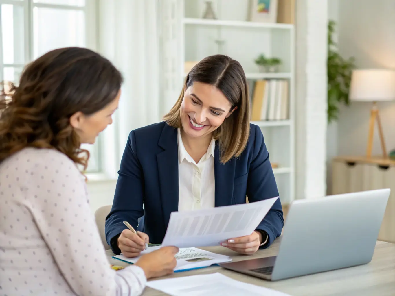 A financial advisor in a modern office setting, reviewing investment portfolios with a client, showcasing zagrkb's personalized investment planning services.